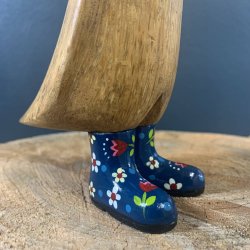 Bl� gummist�vler med blomster