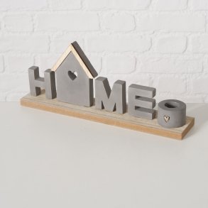 HOME - Figur med lysestage og teksten HOME