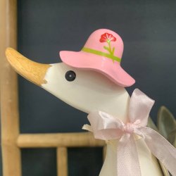 Dcuk and designfigur med hat