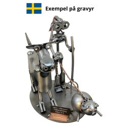 Metallfigur � Kvinnlig lantbrukare