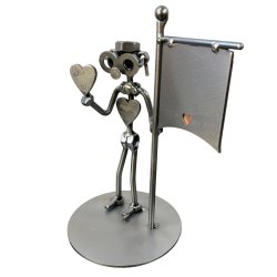 Metalfigur med symbolik � Den Frivillige | Hjertet p� rette sted
