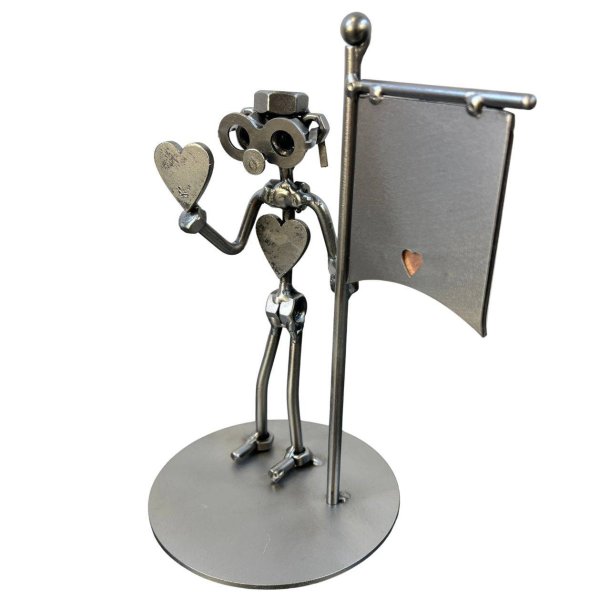 Metalfigur med symbolik � Den Frivillige | Hjertet p� rette sted